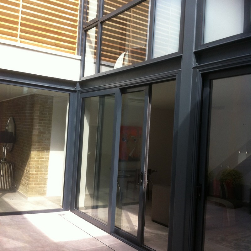 Anthracite aluminium sliding patio doors fitted in Canning Town
